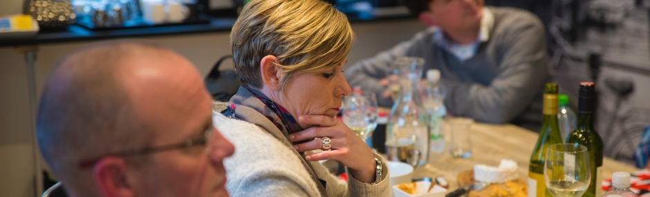 Photo credit: Marianne Stok @ Unsplash. An older female worker during a meeting